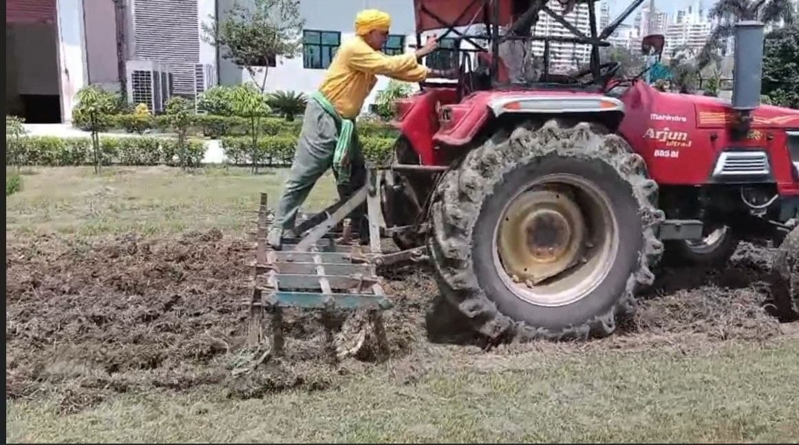 Mahacharya Sourabh J. Sarkar on a tractor plough